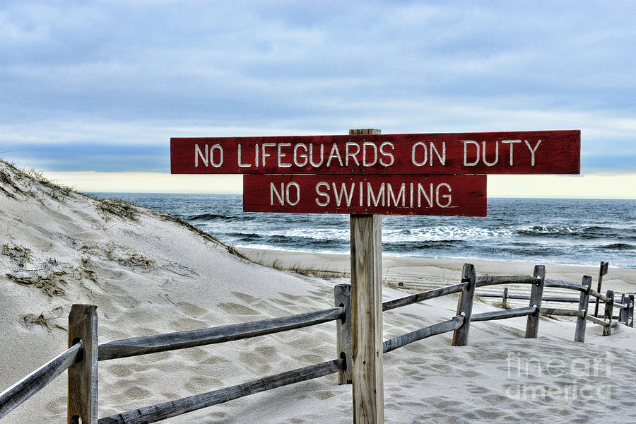 No Lifeguards on Duty Photograph by Paul Ward
