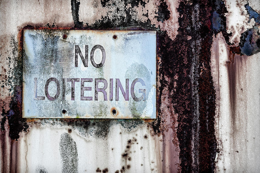 No Loitering Sign on Trash Bin Photograph by Carol Leigh