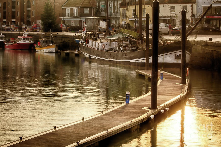 Boat Photograph - Harbour in Wells next the sea in Norfolk England  by Simon Bratt