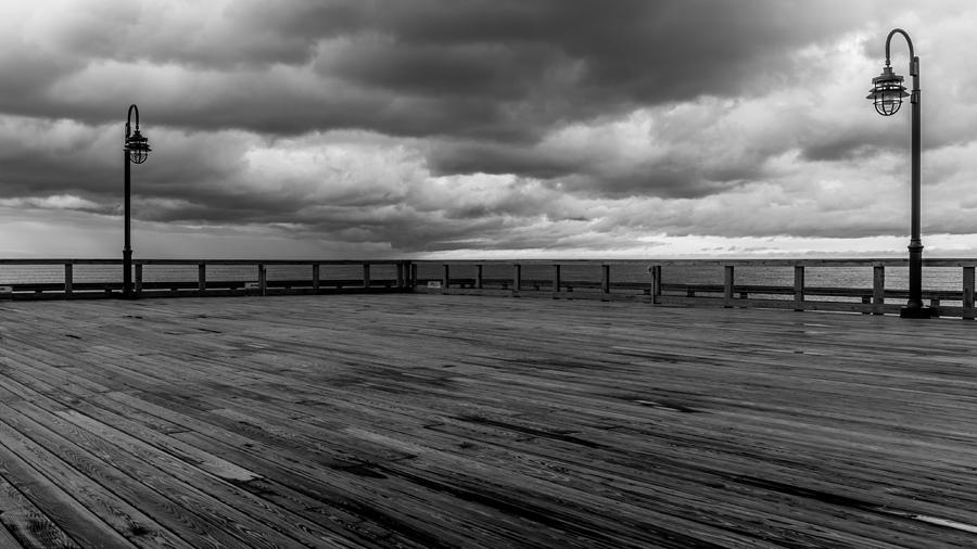 North Beach Pier with Clouds Photograph by Joseph Smith