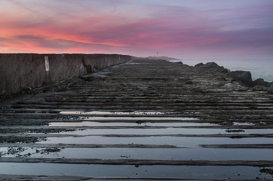 North Jetty at Dusk Photograph by Greg Nyquist