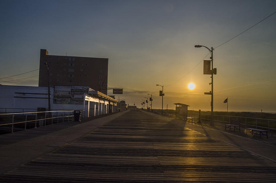 North Wildwood Boardwalk at Sunrise Photograph by Bill Cannon