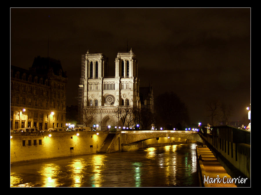 Notre Dame on The Seine Photograph by Mark Currier