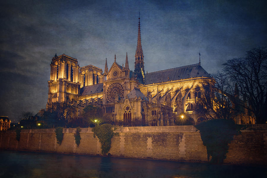 Notre Dame on the Seine Textured Photograph by Joan Carroll
