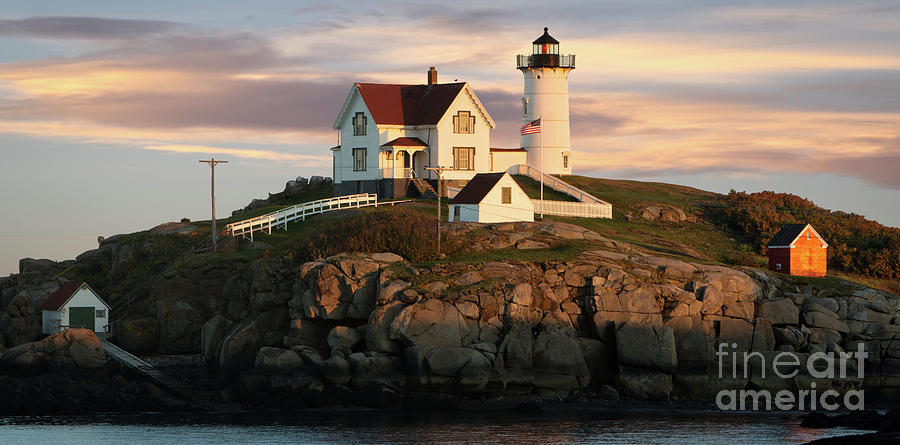 Nubble Lighthouse in Light Photograph by Jerry Fornarotto