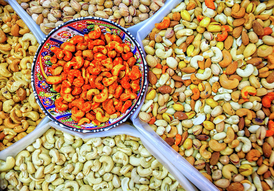 Nuts at the market Photograph by Alexey Stiop