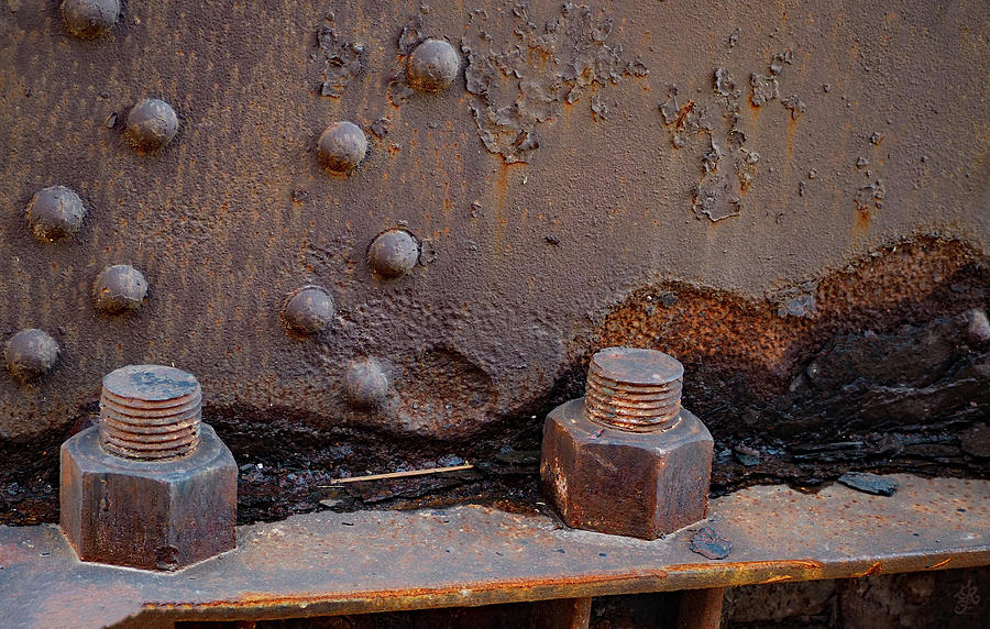 Nuts Bolts and Rust Photograph by Ginger Repke