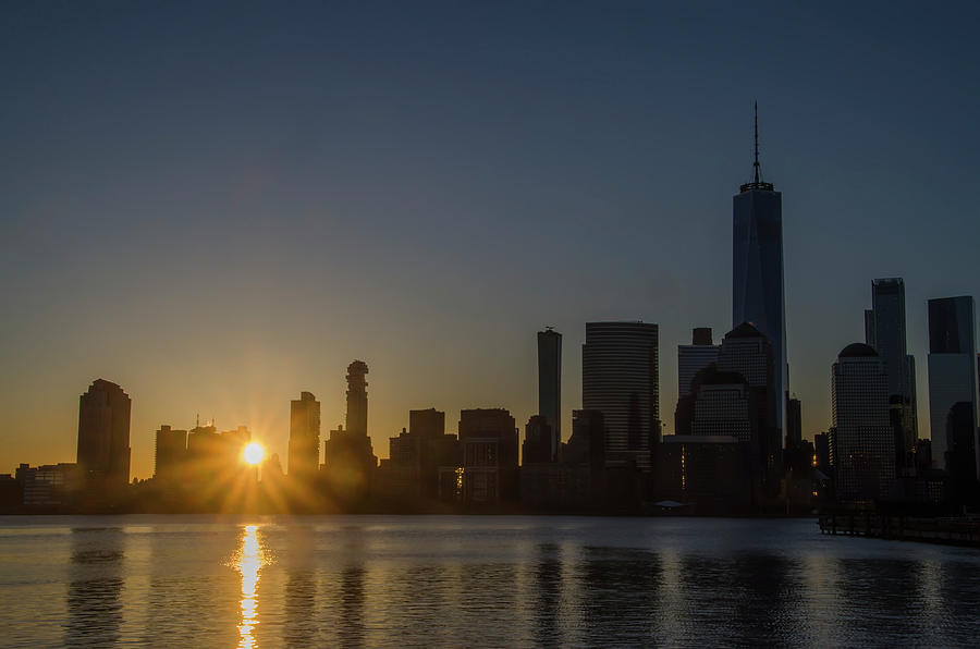 NYC - Here Comes the Sun Photograph by Bill Cannon