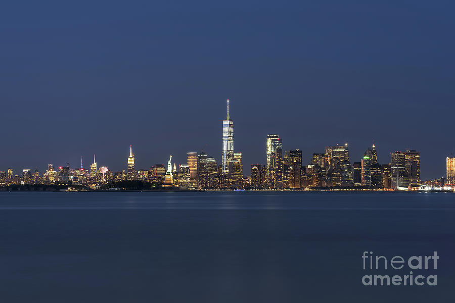 NYC Skyline at Blue Hour Photograph by Michael Ver Sprill