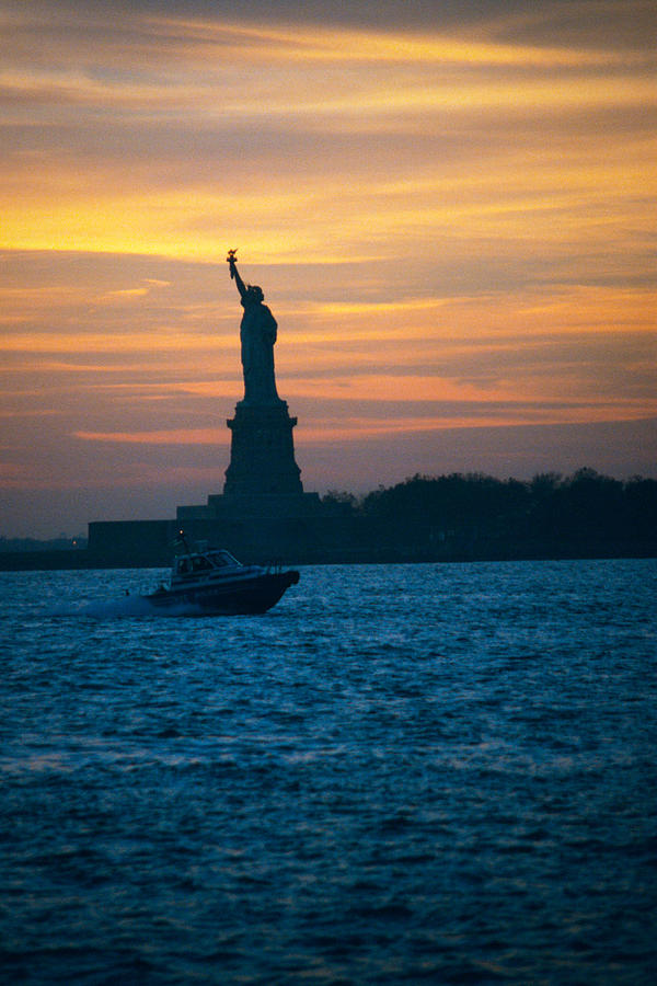 NYPD Boat Protecting the Statue Photograph by Kevin Mcenerney