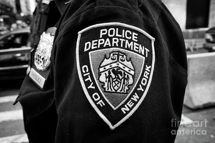 New York City Photograph - nypd police officer badge and crest New York City USA by Joe Fox