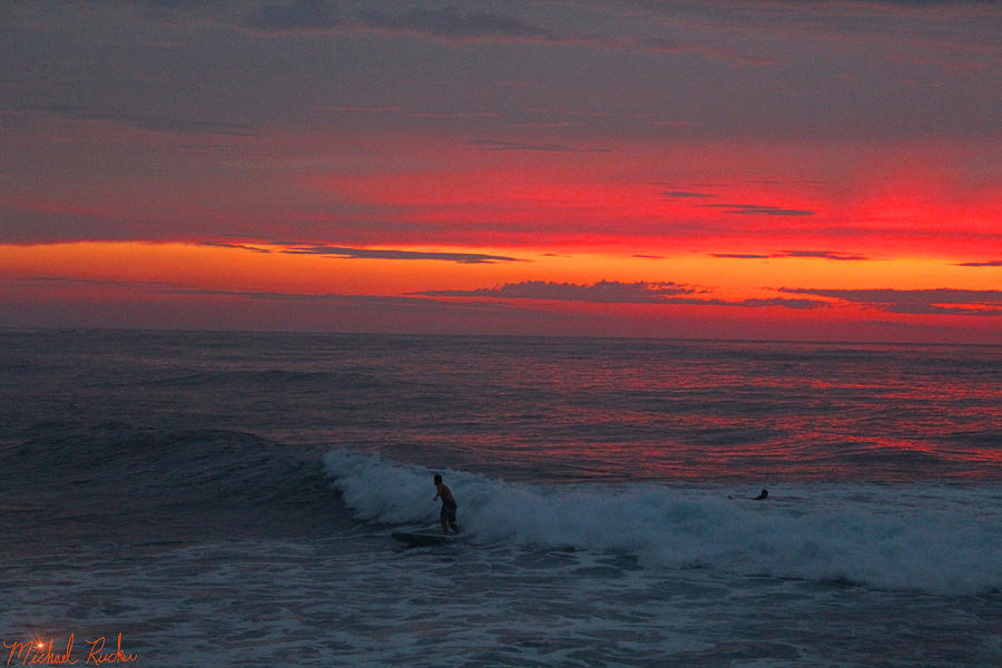 Oahu Surfers at Sunset Photograph by Michael Rucker