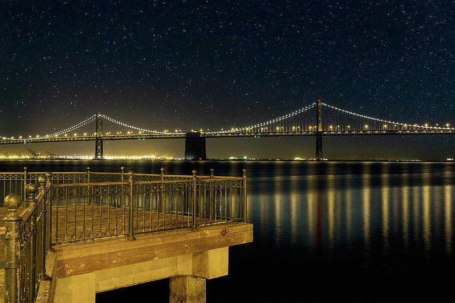 Oakland Bay Bridge by the Pier in San Francisco at Night Photograph by David Gn