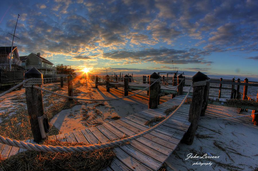 OC Bay sunset Photograph by John Loreaux