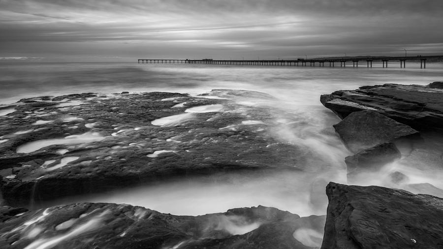 Black And White Photograph - Ocean Beach Tidepools and Pier by Alexander Kunz