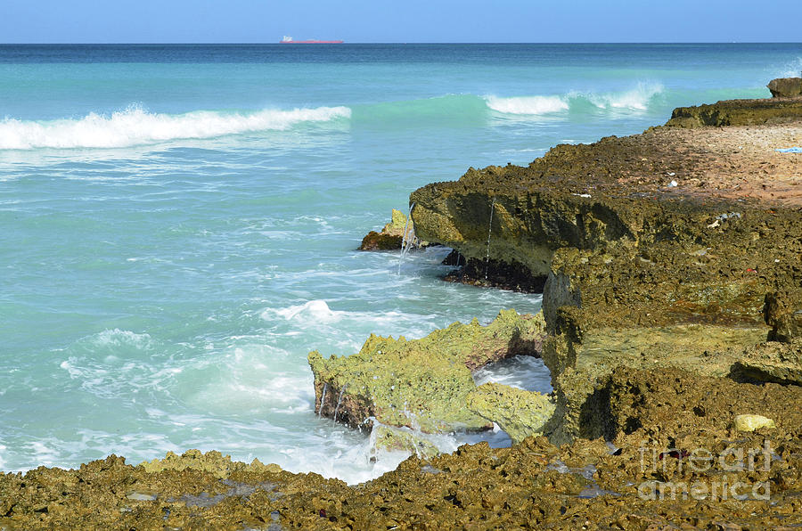 Ocean Waves Crashing on Sharp Jagged Rock Along the Coast Photograph by DejaVu Designs