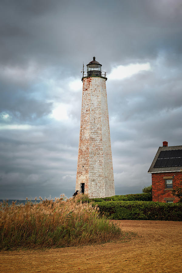 October Skies over Five Mile Point Light Photograph by Simmie Reagor