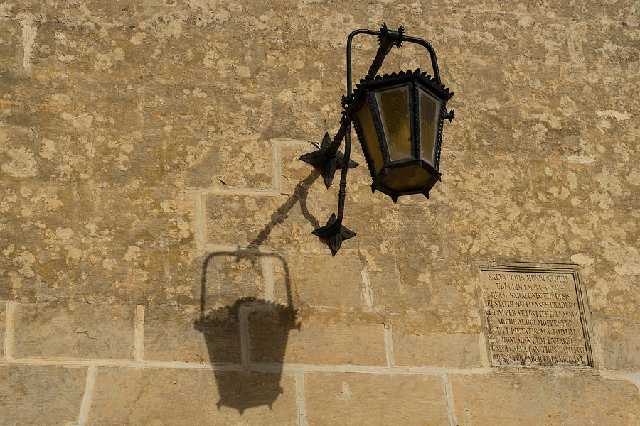 Of Lights and Shadows - Medieval Looking Streetlamp in Mdina the Ancient Capital of Malta Photograph by Georgia Mizuleva