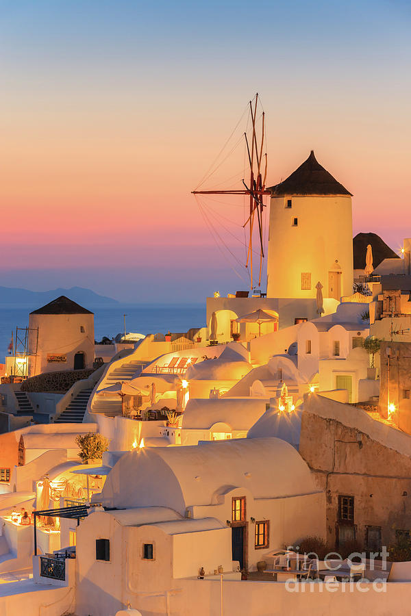 Oia during sunset on Santorini Photograph by Henk Meijer Photography