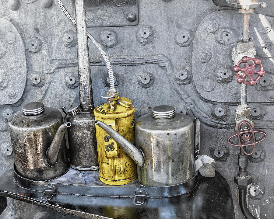 Oil Cans Photograph by Jim Thompson