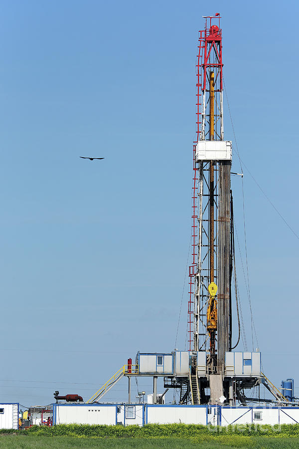 Oil Drilling Rig On Green Field Photograph By Goce Risteski