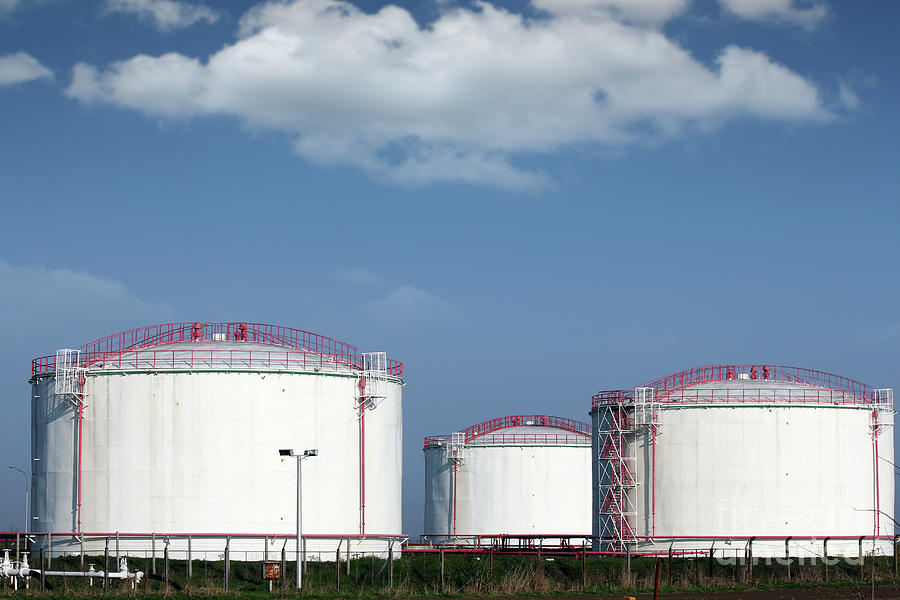 Oil Industry Refinery Tanks On Field Photograph by Goce Risteski - Fine ...