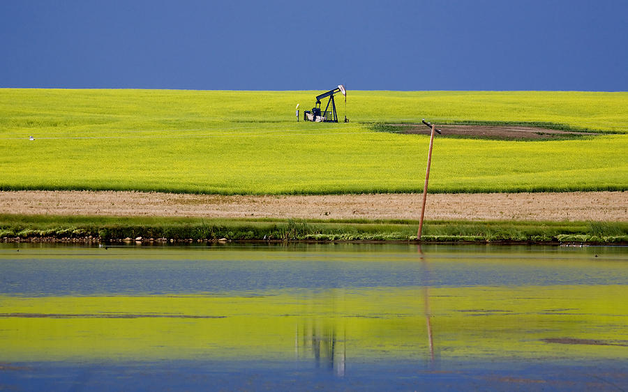 Oil Jack Reflection Saskatchewan Photograph by Mark Duffy