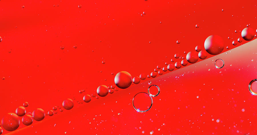 Oil on Water Red and Silver Bubble Abstract Photograph by John Williams