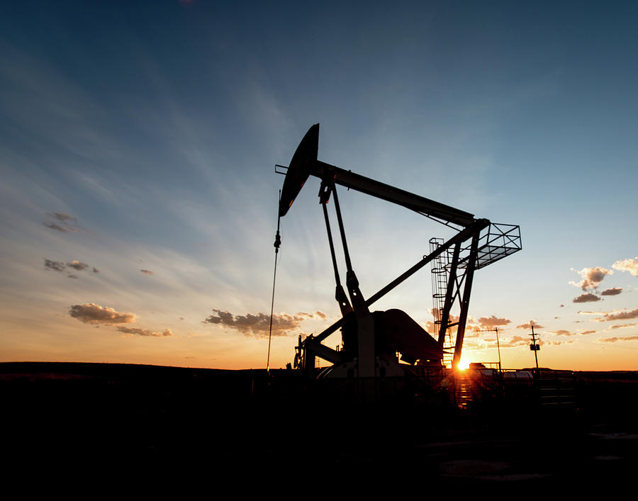 Oil Pumper at Sunset Photograph by Bert Peake