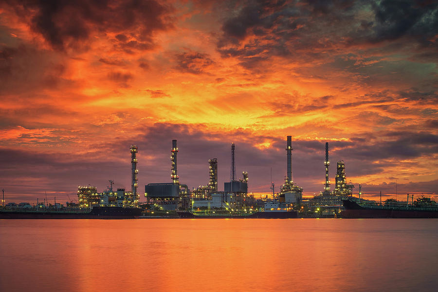 Oil refinery plant and prtroleum industry with morning sunrise Photograph by Anek Suwannaphoom