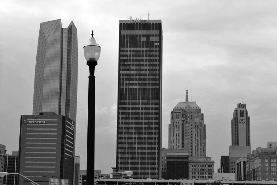 City Photograph - Oklahoma City Skyline with Light Post - Black and White by Matt Quest