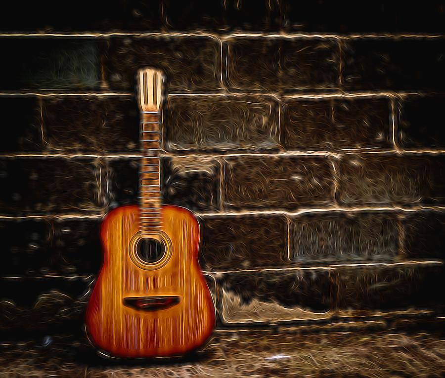 Old Abandoned Guitar and Brick Wall Photograph by John Williams