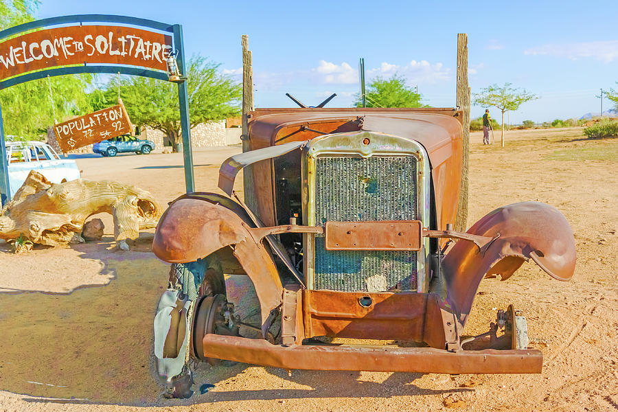 Old and rusty vintage car in Namibia Photograph by Marek Poplawski