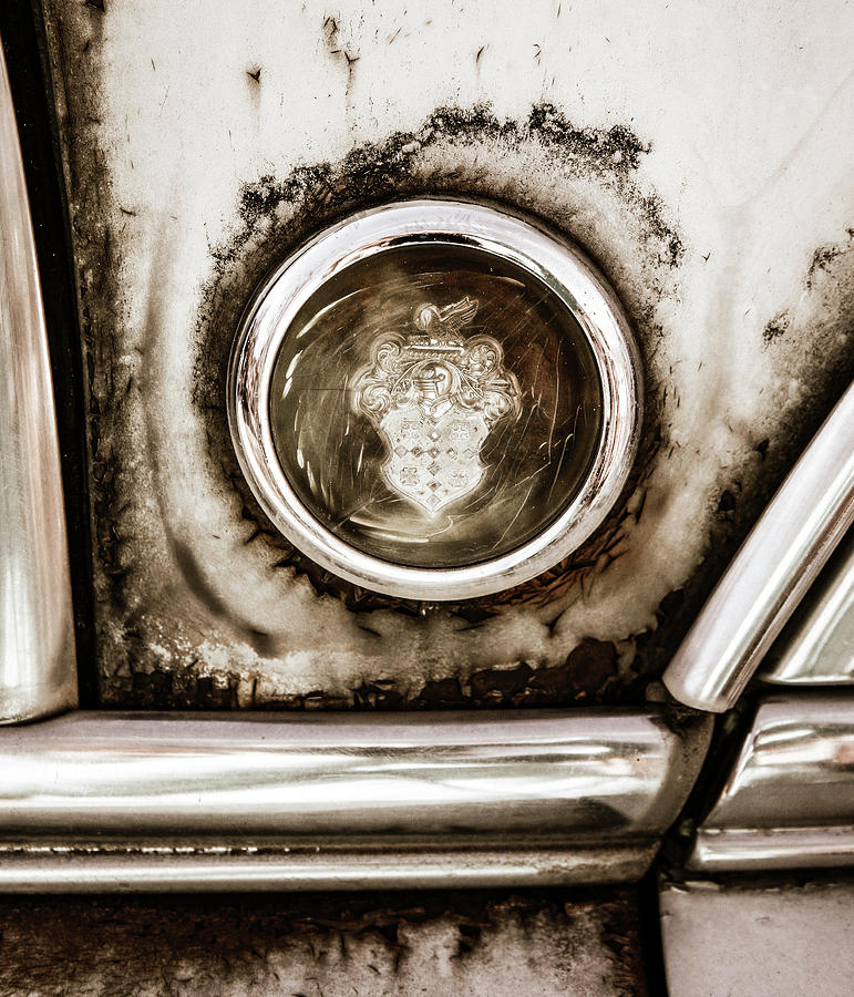 Old and Worn Packard Emblem Photograph by Marilyn Hunt