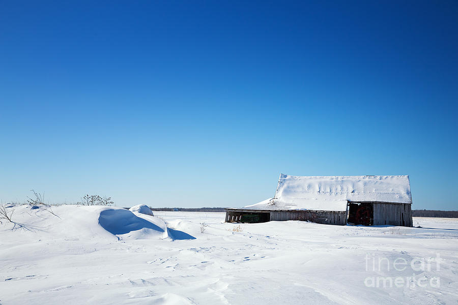Old barn and snow drifts Canada Photograph by Jane Rix