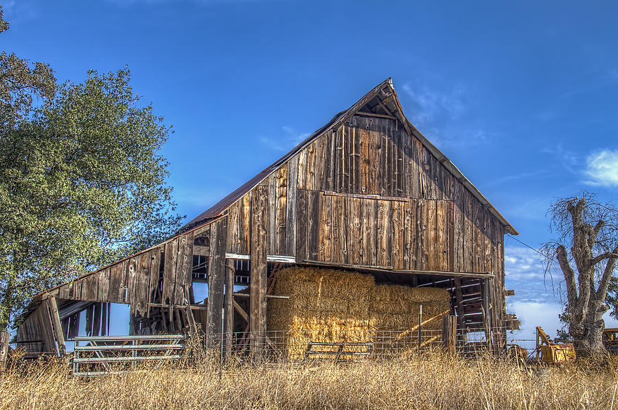 Old Barn with Hay Photograph by Bruce Bottomley