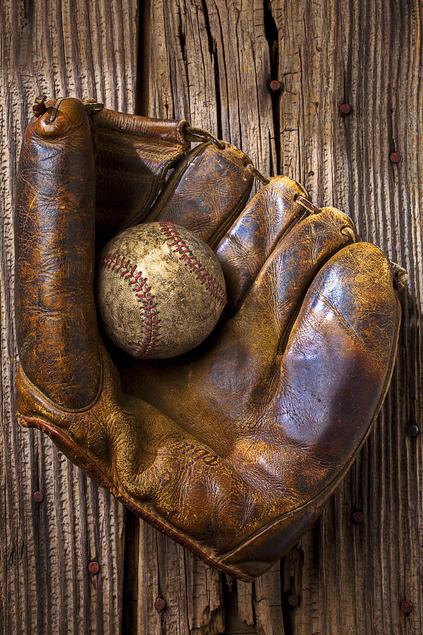 Old baseball mitt and ball Photograph by Garry Gay