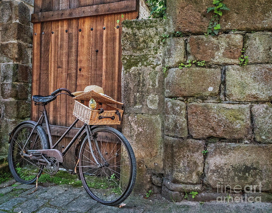Old bike in an old city Photograph by Izet Kapetanovic