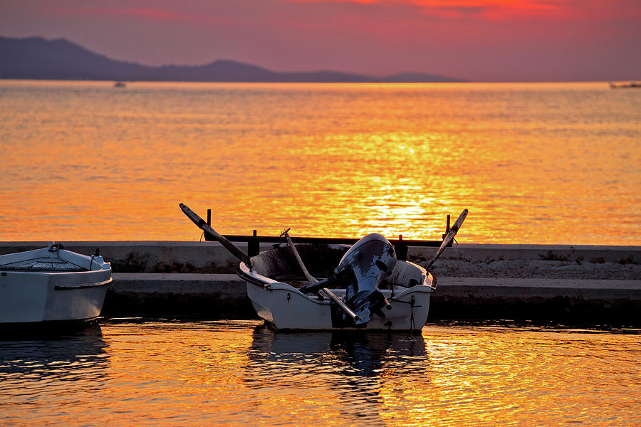 Old boat on golden sunset view Photograph by Brch Photography