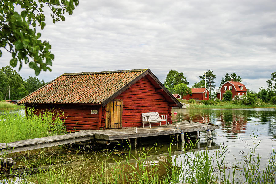 Old boathouse Photograph by Torbjorn Swenelius