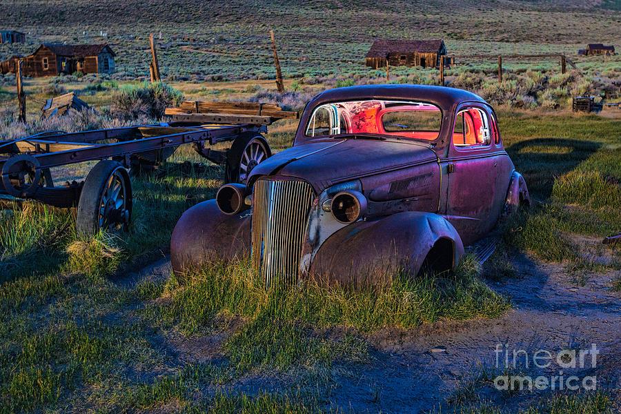 Old Bodie Car By Moonlight Photograph by Mimi Ditchie