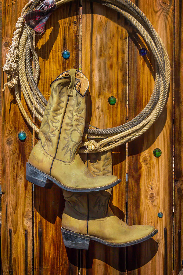 Old Boots And Rope On Fence Photograph by Garry Gay