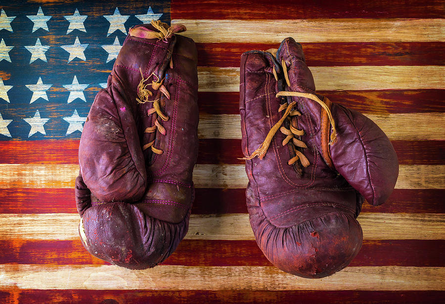 Old Boxing Gloves on American Flag Photograph by Garry Gay