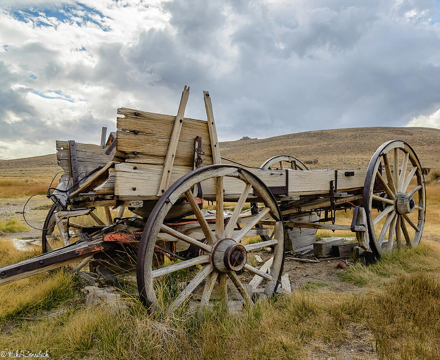 Old Buckboard Wagon Photograph by Mike Ronnebeck