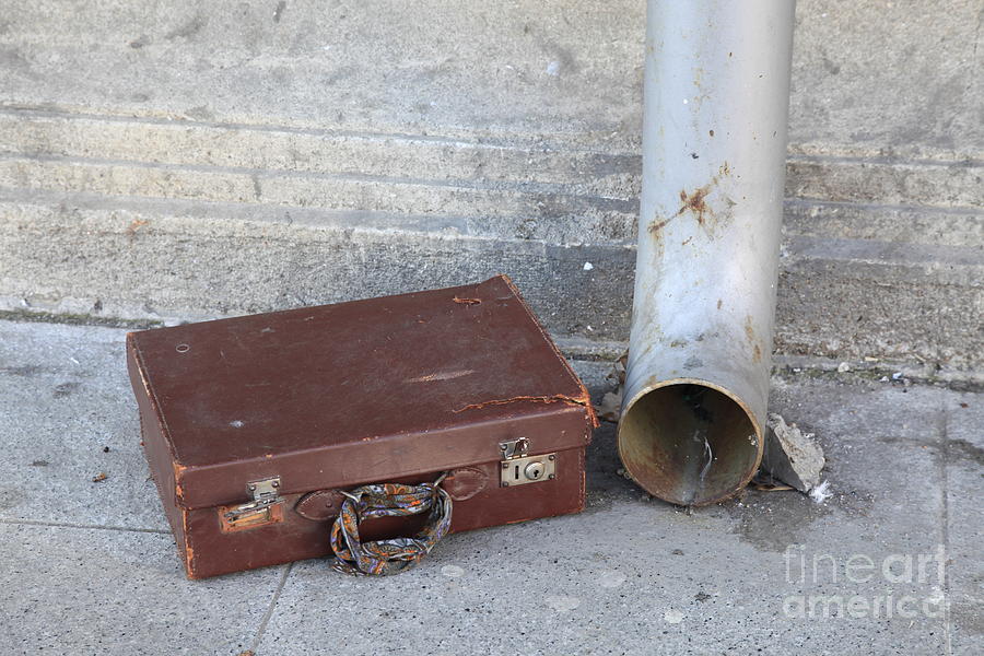 Old cardboard suitcase in the street Photograph by Vladi Alon