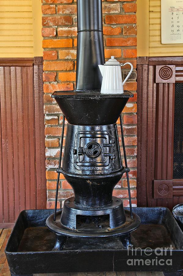 Vintage Photograph - Old Cast Iron Stove 1 by Jimmy Ostgard
