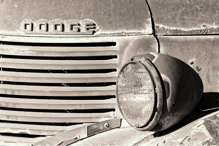 Old Dodge Truck Headlight and Grill bw Photograph by Jerry Fornarotto