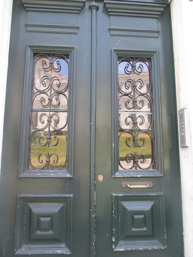 Door Photograph - old door with reflection of Lisbon by Anamarija Marinovic