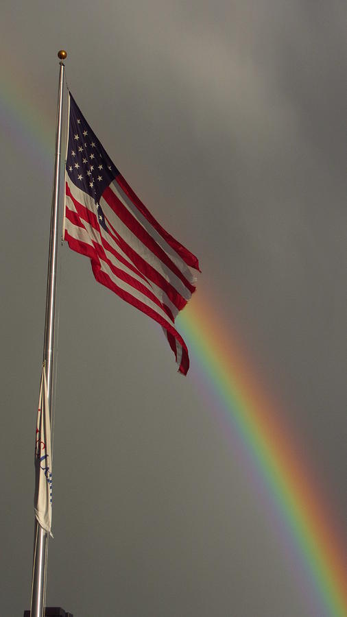 Old Glory and Rainbow Photograph by Bill Tomsa