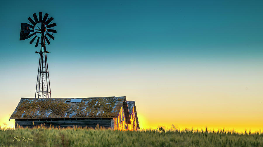 Sunset Photograph - Old Grain Bins Against the Late Evening Sky by Phil And Karen Rispin